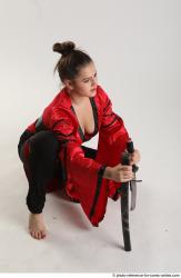 Katerina Ninja Kneeling Pose